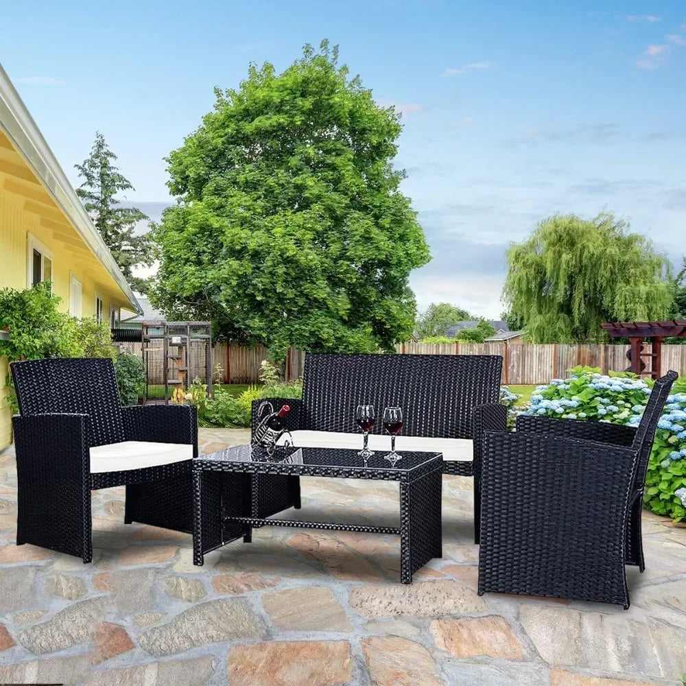 Guangbai 4 Piece Rattan Patio Set With Weatherproof Cushions